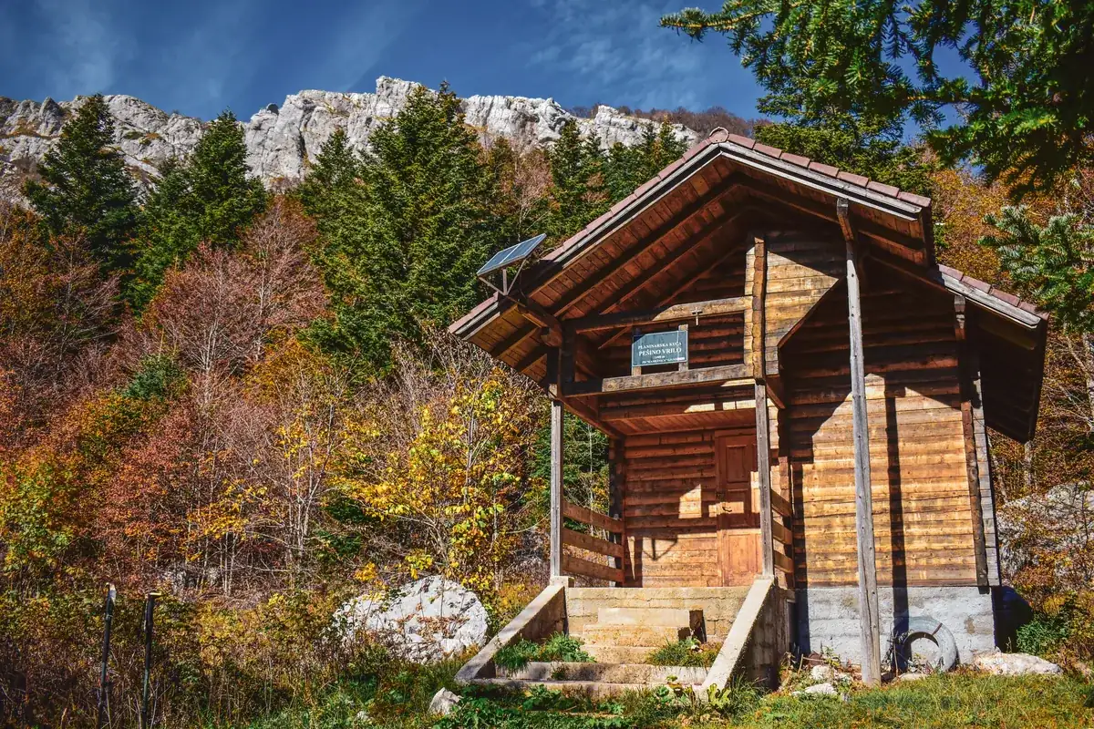 Off-grid solar panels supplying power to a remote rural cabin