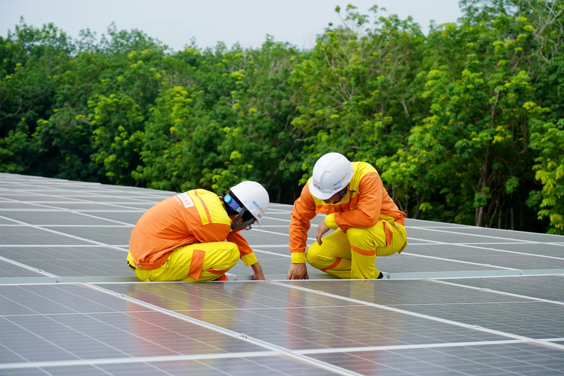 Solar installation crew working on a roof