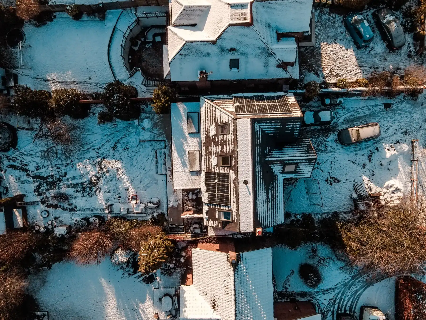 Aerial view of solar panels covering a house roof